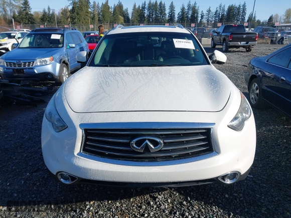 2014 Infiniti QX70 with VIN JN8CS1MW2EM411237, listed as a IAAI auction lot 42011806 with 148,133 mi miles and . Bid and sale history available at carsss.com. Image 12.