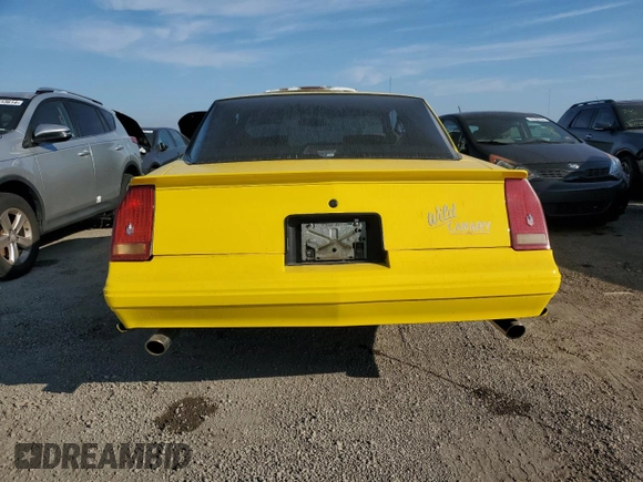 1987 Chevrolet Monte Carlo z VIN 1G1GZ11G1HP127793, wystawiony jako Copart lot #75700654 z przebiegiem 99 478 mil mil oraz Szkody całkowita. Historia ofert i sprzedaży dostępna na DreamBid. Obrazek 6.
