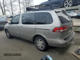 2001 Toyota Sienna LE z VIN 4T3ZF13C91U396296, wystawiony jako Copart lot #88094105 z przebiegiem 111 273 mil mil oraz Tytuł czysty. Historia ofert i sprzedaży dostępna na DreamBid. Obrazek 2.