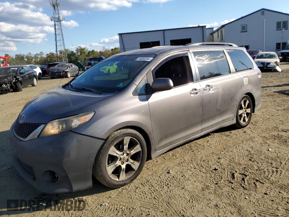 2013 Toyota Sienna SE with VIN 5TDXK3DC8DS310754, listed as a Copart auction lot 74880094 with 337,573 mi miles and Salvage title. Bid and sale history available at DreamBid. Image 1.