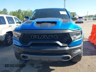 2021 Ram 1500 TRX z VIN 1C6SRFU91MN900450, wystawiony jako IAAI lot #42102724 z przebiegiem 80 071 mil mil oraz . Historia ofert i sprzedaży dostępna na DreamBid. Obrazek 11.