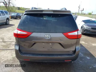 2015 Toyota Sienna LE AAS with VIN 5TDKK3DC5FS575077, listed as a IAAI auction lot 41941483 with 134,265 mi miles. Bid and sale history available at carsss.com. Image 16.