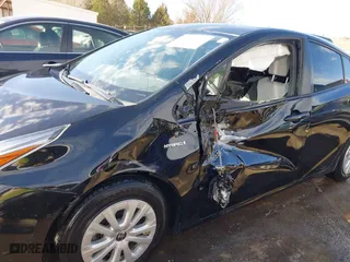 2020 Toyota Prius L Eco with VIN JTDKARFU7L3119834, listed as a IAAI auction lot 41653177 with 140,964 mi miles. Bid and sale history available at carsss.com. Image 6.