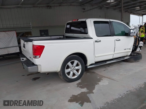 2015 Nissan Titan SV z VIN 1N6BA0ED1FN502929, wystawiony jako IAAI lot #42431227 z przebiegiem 138 394 mil mil oraz . Historia ofert i sprzedaży dostępna na DreamBid. Obrazek 4.