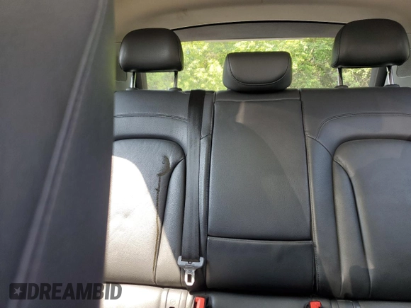 2015 Audi Q3 with VIN WA1EFEFS7FR002823, listed as a Copart auction lot 62159355 with 163,640 mi miles and Salvage title. Bid and sale history available at DreamBid. Image 10.