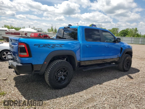 2022 Ram 1500 TRX with VIN 1C6SRFU93NN229879, listed as a Copart auction lot 58710335 with 8,047 mi miles and Salvage title. Bid and sale history available at DreamBid. Image 3.