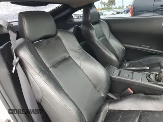 2004 Nissan 350Z Touring z VIN JN1AZ34E84T063971, wystawiony jako Copart lot #57267825 z przebiegiem 131 036 mil mil oraz Szkoda całkowita • Salvage title. Historia ofert i sprzedaży dostępna na DreamBid. Obrazek 10.