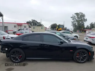 2019 Dodge Charger Scat Pack с VIN 2C3CDXGJ7KH717796, выставлен на аукционе IAAI как лот 42244154 с пробегом 84 385 миль миль и . История ставок и продаж доступна на DreamBid. Изображение 14.