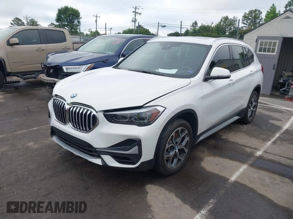 2021 BMW X1 xDrive28i with VIN WBXJG9C01M5S06181, listed as a IAAI auction lot 42292167 with 55,966 mi miles and . Bid and sale history available at DreamBid. Image 2.