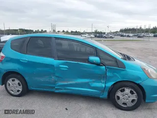 2013 Honda Fit with VIN JHMGE8H3XDC047486, listed as a IAAI auction lot 41543068 with 73,414 mi miles. Bid and sale history available at carsss.com. Image 6.