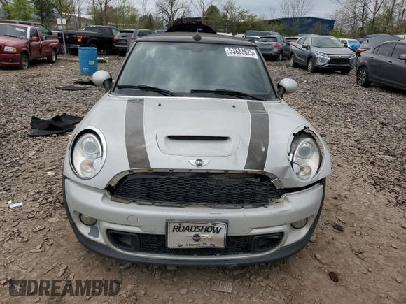 2015 MINI Convertible S with VIN WMWZP3C57F2A91437, listed as a Copart auction lot 53883525 with 28,185 mi miles and Salvage title. Bid and sale history available at DreamBid. Image 5.