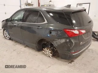 2019 Chevrolet Equinox LT with VIN 2GNAXKEV1K6157781, listed as a IAAI auction lot 41274846 with 128,425 mi miles and . Bid and sale history available at DreamBid. Image 3.