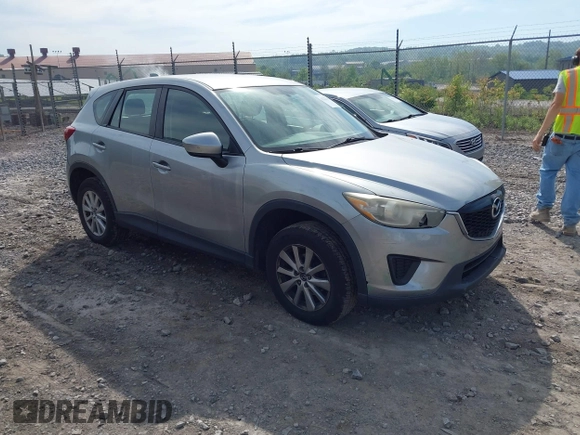 2014 Mazda CX-5 Sport with VIN JM3KE2BE9E0423737, listed as a IAAI auction lot 42222646 with 116,160 mi miles and . Bid and sale history available at DreamBid. Image 1.