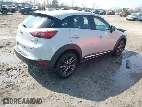 2016 Mazda CX-3 Grand Touring with VIN JM1DKFD76G0134205, listed as a IAAI auction lot 41661904 with 190,368 mi miles. Bid and sale history available at carsss.com. Image 4.