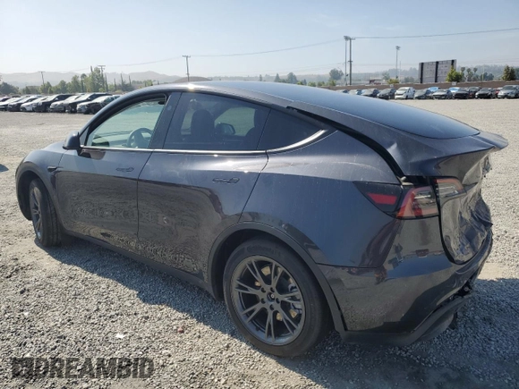 2024 Tesla Model Y Long Range z VIN 7SAYGDEE3RF121102, wystawiony jako Copart lot #60548895 z przebiegiem 13 336 mil mil oraz Szkoda całkowita • Salvage title. Historia ofert i sprzedaży dostępna na DreamBid. Obrazek 2.