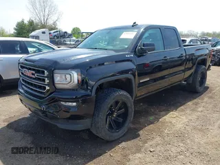 2017 GMC Sierra 1500 SLE z VIN 1GTV2MEC2HZ105964, wystawiony jako IAAI lot #42091941 z przebiegiem 93 779 mil mil oraz . Historia ofert i sprzedaży dostępna na DreamBid. Obrazek 2.