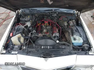 1991 Cadillac Brougham z VIN 1G6DW5470MR718950, wystawiony jako IAAI lot #41726864 z przebiegiem 207 324 mil mil oraz . Historia ofert i sprzedaży dostępna na DreamBid. Obrazek 10.