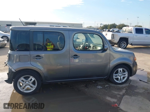 2013 Nissan Cube SL z VIN JN8AZ2KR8DT301092, wystawiony jako IAAI lot #41328574 z przebiegiem Nie podano mil oraz . Historia ofert i sprzedaży dostępna na DreamBid. Obrazek 14.