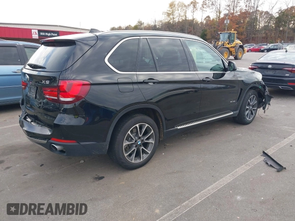 2016 BMW X5 sDrive35i with VIN 5UXKR2C59G0U17661, listed as a IAAI auction lot 40931088 with 90,963 mi miles. Bid and sale history available at carsss.com. Image 4.