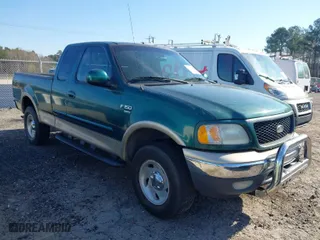 2000 Ford F-150 XL with VIN 1FTRX18L4YNA94311, listed as a IAAI auction lot 41814890 with 1 mi miles. Bid and sale history available at carsss.com. Image 1.