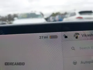 2022 Tesla Model 3 with VIN 5YJ3E1EA6NF143839, listed as a IAAI auction lot 40905007 with 83,897 mi miles and . Bid and sale history available at DreamBid. Image 16.