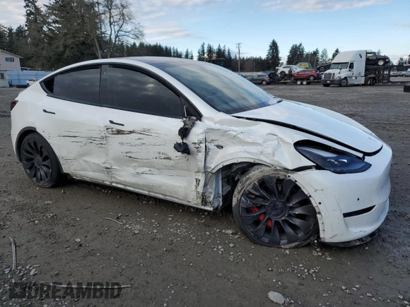 2022 Tesla Model Y Performance with VIN 7SAYGDEF2NF325084, listed as a Copart auction lot 44814525 with Not Provided miles and Salvage Title. Bid and sale history available at DreamBid. Image 4.