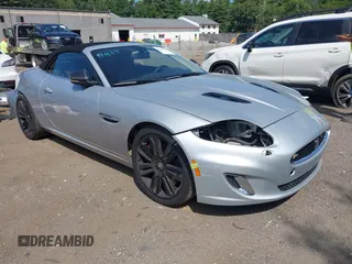 2012 Jaguar XK with VIN SAJWA4EC9CMB45251, listed as a IAAI auction lot 40242636 with 61,538 mi miles. Bid and sale history available at carsss.com. Image 1.