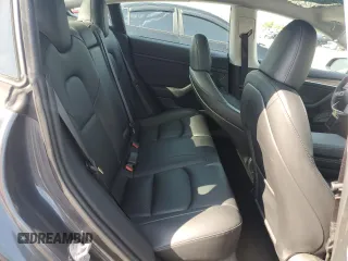 2023 Tesla Model 3 z VIN 5YJ3E1EA1PF647301, wystawiony jako Copart lot #58545905 z przebiegiem 21 082 mil mil oraz Szkody całkowita. Historia ofert i sprzedaży dostępna na DreamBid. Obrazek 10.