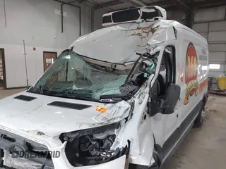 2020 Ford Transit Cargo z VIN 1FTBR2C81LKA68599, wystawiony jako IAAI lot #41381157 z przebiegiem 63 382 mil mil oraz . Historia ofert i sprzedaży dostępna na DreamBid. Obrazek 6.