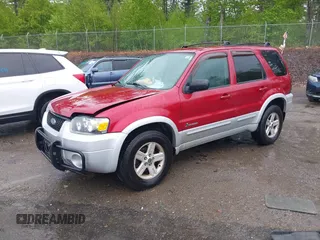 2005 Ford Escape Hybrid with VIN 1FMCU96H95KC81872, listed as a IAAI auction lot 42292225 with 165,259 mi miles and . Bid and sale history available at DreamBid. Image 2.
