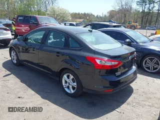 2014 Ford Focus SE with VIN 1FADP3F2XEL120830, listed as a IAAI auction lot 42082905 with 19,128 mi miles and . Bid and sale history available at DreamBid. Image 3.