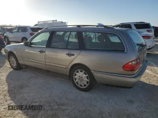 1998 Mercedes-Benz E-Class with VIN WDBJH65F9WA597132, listed as a Copart auction lot 77780094 with 0 mi miles and Salvage Title. Bid and sale history available at carsss.com. Image 2.