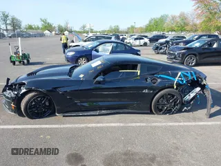 2017 Chevrolet Corvette 1LT z VIN 1G1YA2D74H5119714, wystawiony jako IAAI lot #42156867 z przebiegiem 54 761 mil mil oraz . Historia ofert i sprzedaży dostępna na DreamBid. Obrazek 14.