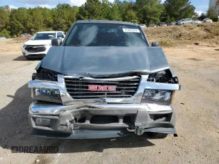 2009 GMC Canyon Work Truck with VIN 1GTDT19E698142512, listed as a Copart auction lot 77493574 with 0 mi miles and Salvage Title. Bid and sale history available at carsss.com. Image 5.