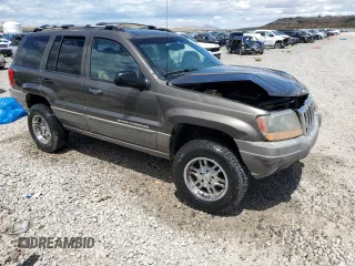 1999 Jeep Grand Cherokee Laredo с VIN 1J4GW58S5XC612309, выставлен на аукционе Copart как лот 56705085 с пробегом 200 004 миль миль и Списание • Salvage title. История ставок и продаж доступна на DreamBid. Изображение 4.