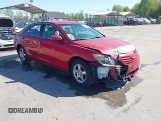 2007 Toyota Camry CE with VIN JTNBE46K073031988, listed as a IAAI auction lot 42062321 with 238,925 mi miles. Bid and sale history available at carsss.com. Image 1.