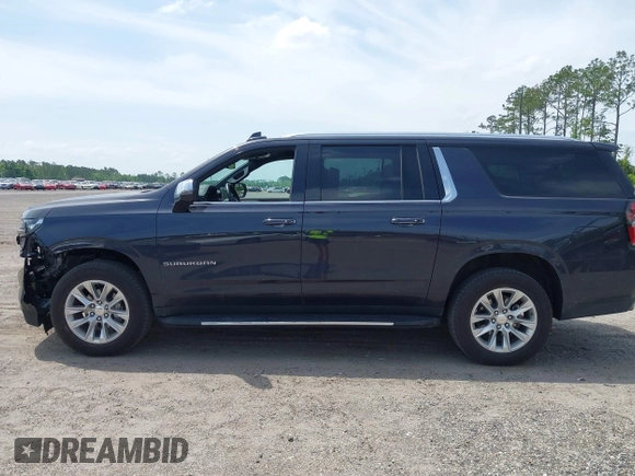 2023 Chevrolet Suburban Premier z VIN 1GNSCFKD8PR479381, wystawiony jako IAAI lot #42096493 z przebiegiem 41 538 mil mil oraz . Historia ofert i sprzedaży dostępna na DreamBid. Obrazek 14.