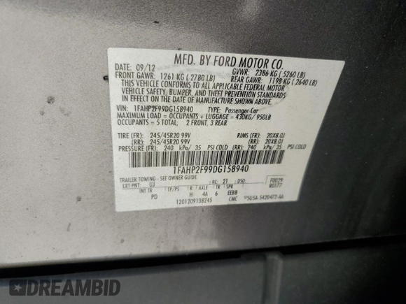 2013 Ford Taurus Limited с VIN 1FAHP2F99DG158940, выставлен на аукционе Copart как лот 66111234 с пробегом 208 640 миль миль и Списание • Salvage title. История ставок и продаж доступна на DreamBid. Изображение 14.