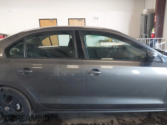 2014 Volkswagen Jetta Sedan S with VIN 3VW2K7AJ5EM410491, listed as a IAAI auction lot 42083614 with 65,960 mi miles. Bid and sale history available at carsss.com. Image 14.