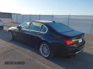 2013 BMW 7 Series 750Li xDrive with VIN WBAYF8C53DD140448, listed as a IAAI auction lot 41933840 with 119,013 mi miles. Bid and sale history available at carsss.com. Image 3.
