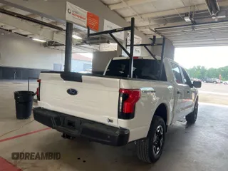 2022 Ford F-150 Lightning Pro with VIN 1FTVW1EL5NWG11725, listed as a IAAI auction lot 42832825 with 5,044 mi miles and . Bid and sale history available at DreamBid. Image 9.