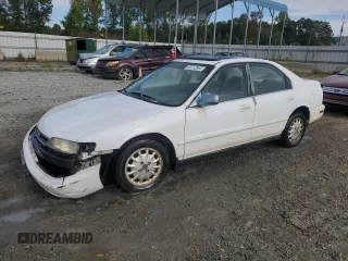 1996 Honda Accord EX with VIN 1HGCD5657TA001356, listed as a Copart auction lot 69712964 with 241,689 mi miles and Salvage Title. Bid and sale history available at carsss.com. Image 1.