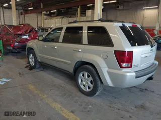 2010 Jeep Grand Cherokee Laredo with VIN 1J4RR4GT9AC106381, listed as a IAAI auction lot 41723268 with 180,008 mi miles. Bid and sale history available at carsss.com. Image 3.
