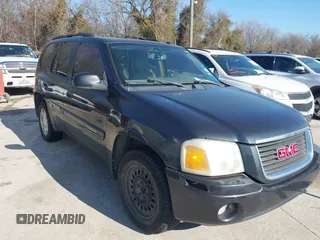 2005 GMC Envoy SLE with VIN 1GKDS13S952304877, listed as a IAAI auction lot 41474232 with 173,676 mi miles and . Bid and sale history available at DreamBid. Image 1.