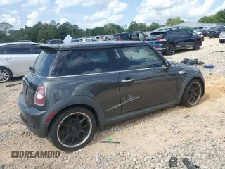 2012 MINI Hardtop S with VIN WMWSV3C50CTY18637, listed as a Copart auction lot 57771015 with 103,402 mi miles and Salvage title. Bid and sale history available at DreamBid. Image 3.