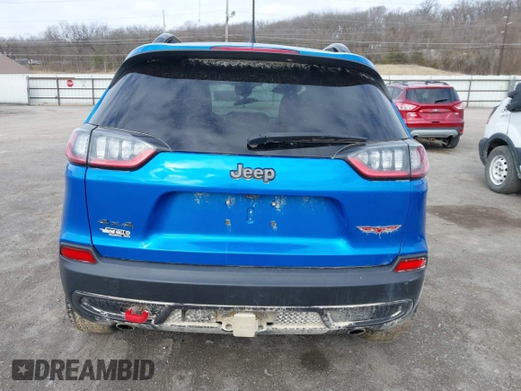 2022 Jeep Cherokee Trailhawk z VIN 1C4PJMBX1ND539319, wystawiony jako IAAI lot #41811178 z przebiegiem 49 922 mil mil oraz . Historia ofert i sprzedaży dostępna na DreamBid. Obrazek 17.