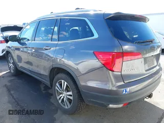 2017 Honda Pilot EX-L with VIN 5FNYF6H57HB021350, listed as a IAAI auction lot 41673635 with 101,980 mi miles and . Bid and sale history available at DreamBid. Image 3.