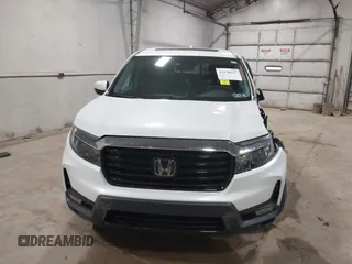 2022 Honda Ridgeline RTL-E z VIN 5FPYK3F76NB033832, wystawiony jako IAAI lot #41838047 z przebiegiem 16 497 mil mil oraz . Historia ofert i sprzedaży dostępna na DreamBid. Obrazek 13.