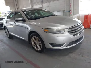 2014 Ford Taurus SEL z VIN 1FAHP2E82EG139690, wystawiony jako IAAI lot #42312483 z przebiegiem 170 029 mil mil oraz . Historia ofert i sprzedaży dostępna na DreamBid. Obrazek 1.