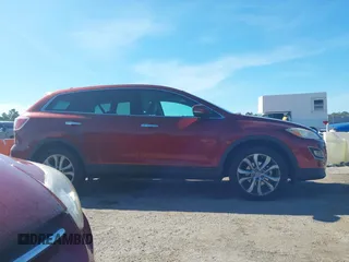 2011 Mazda CX-9 Grand Touring с VIN JM3TB3DV9B0314125, выставлен на аукционе IAAI как лот 41886308 с пробегом 109 521 миль миль и . История ставок и продаж доступна на DreamBid. Изображение 14.